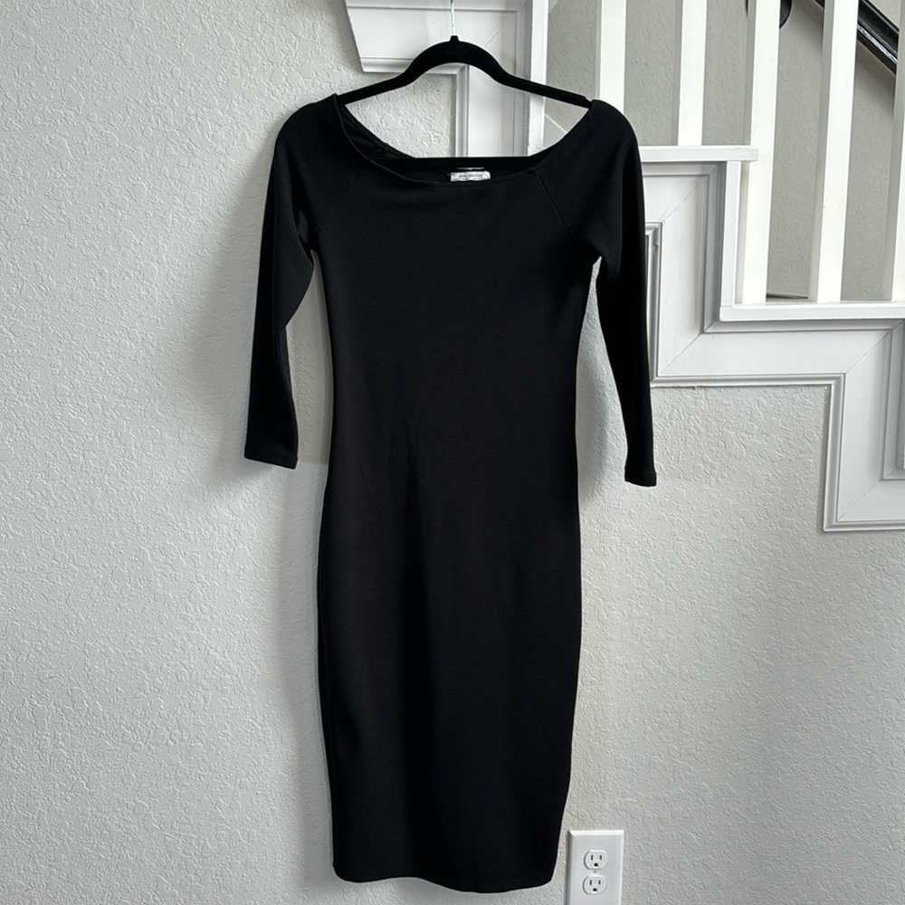 Women’s black midi dress by Zara